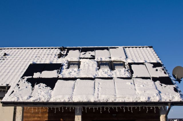 A Reddit user shared a photo of their creative solution for clearing snow from their rooftop solar panels.