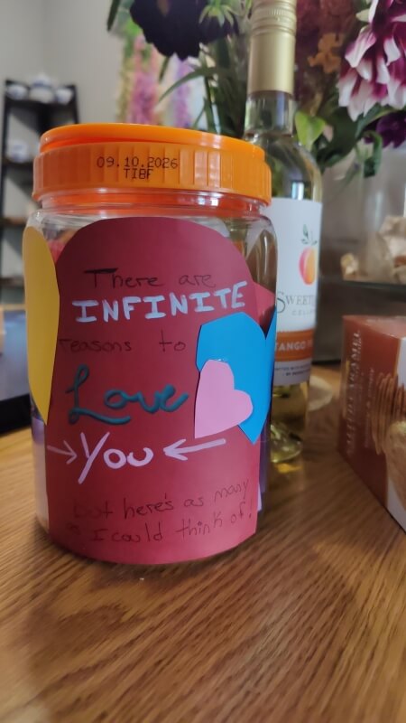 One resourceful Reddit user turned a cat treat container into an upcycled anniversary gift filled with sweet notes.