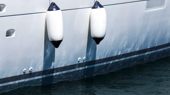 Reddit users were shocked by audacious images of a luxury yacht connected to three additional boats and a helipad.