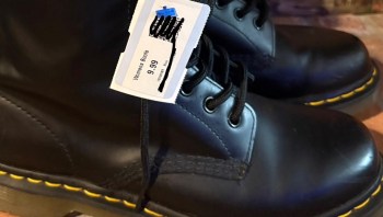 One Redditor shared a heartwarming thrift store encounter after a stranger gifted him a pair of Doc Martens.