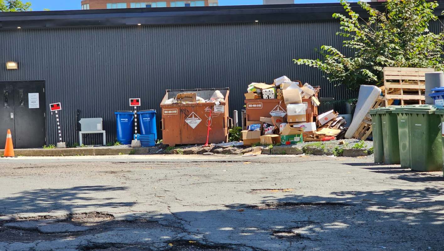 A Redditor shared photos of an impressive haul of unused products, including Timberland leggings, that came from the trash at TJ Maxx.