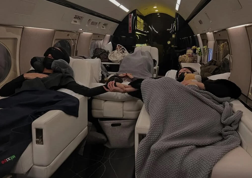 A photo showing the band Katseye flying on a private jet recently resurfaced on Reddit, prompting a viral backlash.
