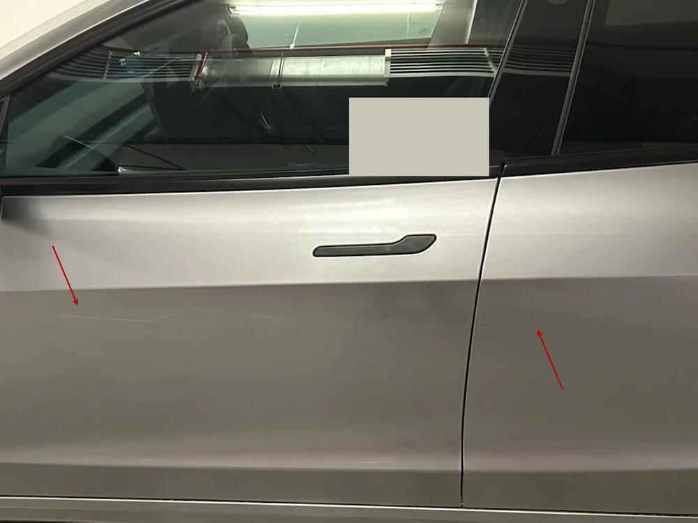 One Tesla owner was shocked to discover a huge scratch on the side of their car and asked Reddit for advice.