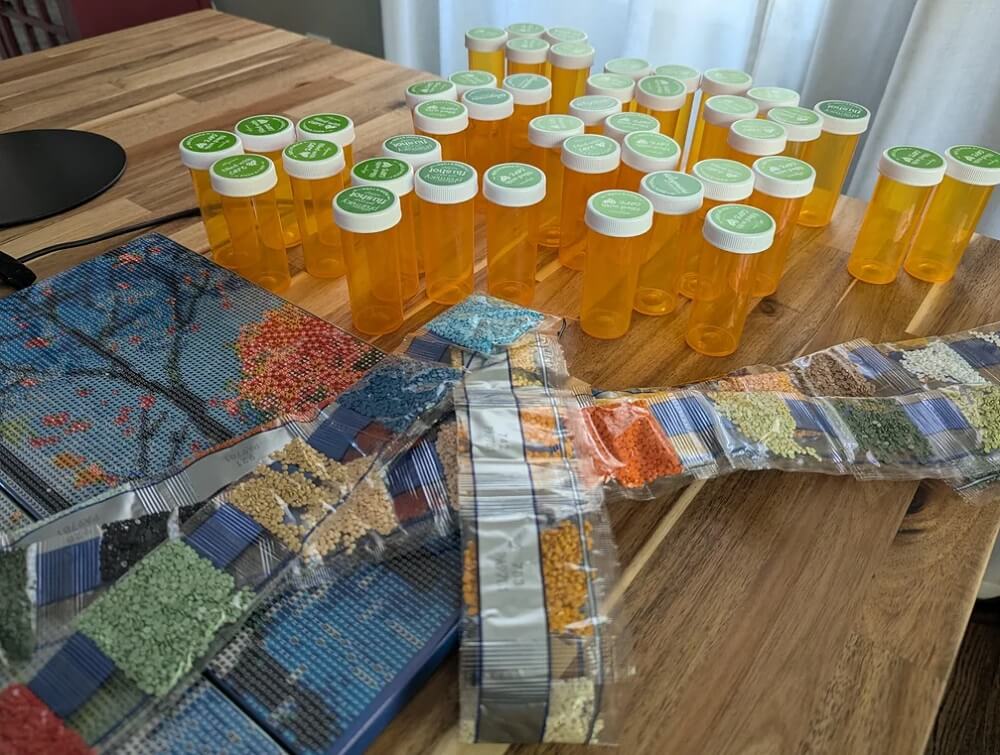 One resourceful Redditor's ingenious hack for storing diamond painting supplies uses empty pill bottles.