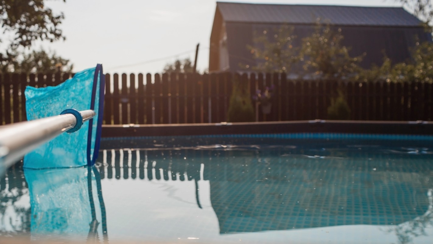 One frustrated homeowner shared photos of water pooling across their gravelled yard after a neighbour drained water from their pool directly onto the property.