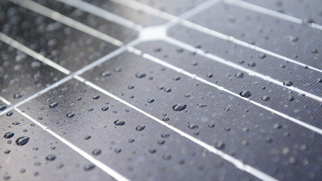 MIT researchers developed a lightweight polymer coating for solar panels, known as 2DPA-1, to limit the corrosive damage that gas particles can inflict.