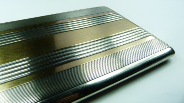 One Redditor's girlfriend got lucky and found $143 in cash hidden inside a thrifted motorcycle cigarette case.