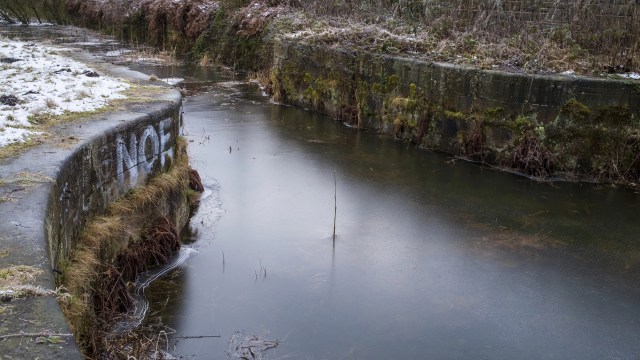 The United Kingdom's Environment Agency opened a "pollution investigation" after millions of black plastic biobeads were found near a river in Greater Manchester.