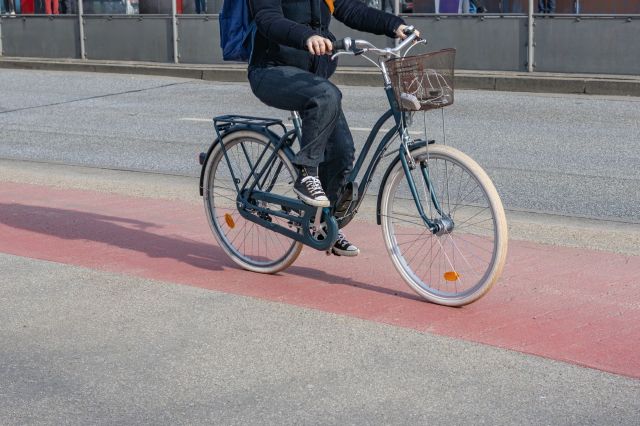 One Reddit user has sparked discussion online after sharing photos of a police officer stationed beside a biking path, issuing hefty fines to cyclists for speeding.