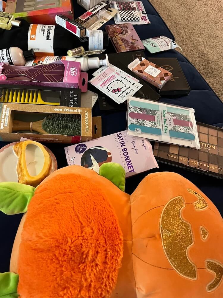 A Redditor shared photos of an impressive haul of unused products, including Timberland leggings, that came from the trash at TJ Maxx.
