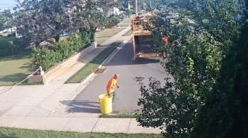 Security footage revealed a municipal worker collecting paper materials along with other recyclables and dumping them all into the same truck compartment.