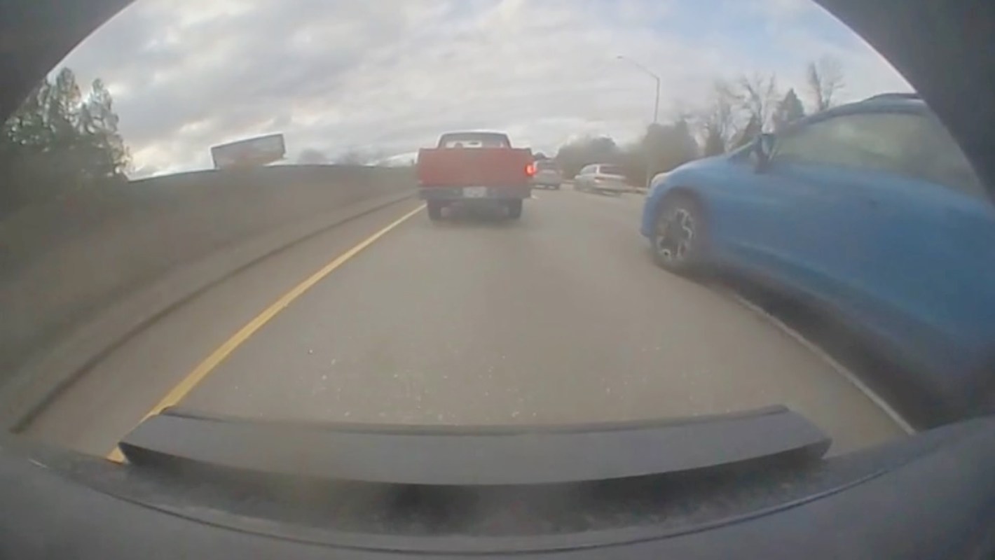 A tense dashcam video captured an aggressive driving encounter involving a Rivian and a Subaru.
