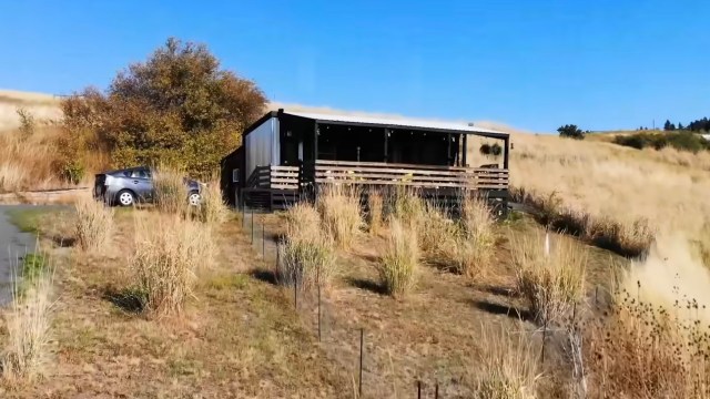 Americans are considering alternative housing options like tiny homes amid inflation and record unemployment.