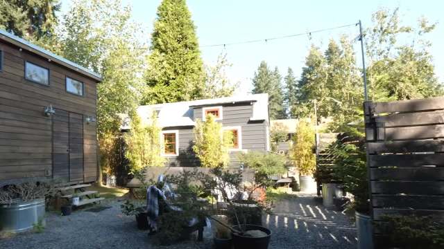 Parents Malissa and Chris Tack gave a tour of their collection of tiny homes on Tiny House Giant Journey.