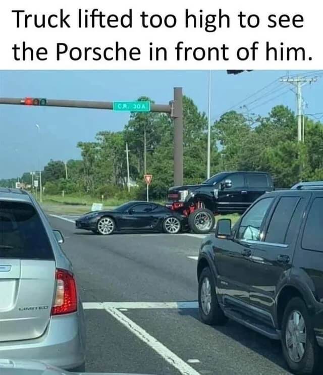 One Reddit user's photo highlighted the dangers of lifted trucks, depicting a colossal pickup towering over a sleek sports car.