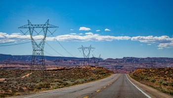 One solution is to bury power lines underground, where they're safe from the high winds and falling trees associated with storms.