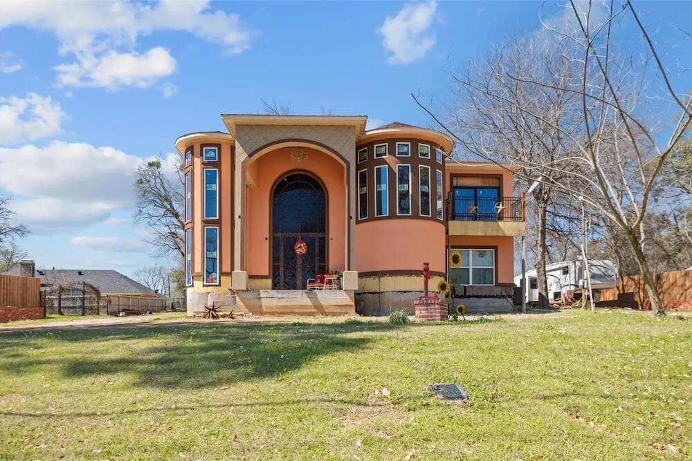 A Redditor shared photos of an unfinished McMansion that created an eyesore in a Texas neighborhood.