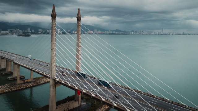 A truck driver attempted to smuggle over 14,000 vapes between Malaysia and Singapore, facing severe consequences for his actions.