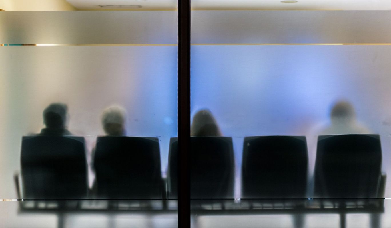 A Redditor shared a frustrating experience with waiting room advertising, prompting a larger discussion on overconsumption.