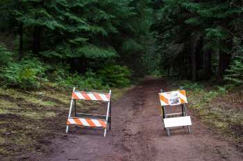 Two popular trails that wind through the dramatic scenery in the Columbia River Gorge Scenic Area remain closed in the wake of damaging December floods.