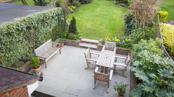 Redditors were livid after an HOA fined a homeowner $350 and then laid down absurd penalties for a small gardening mistake.