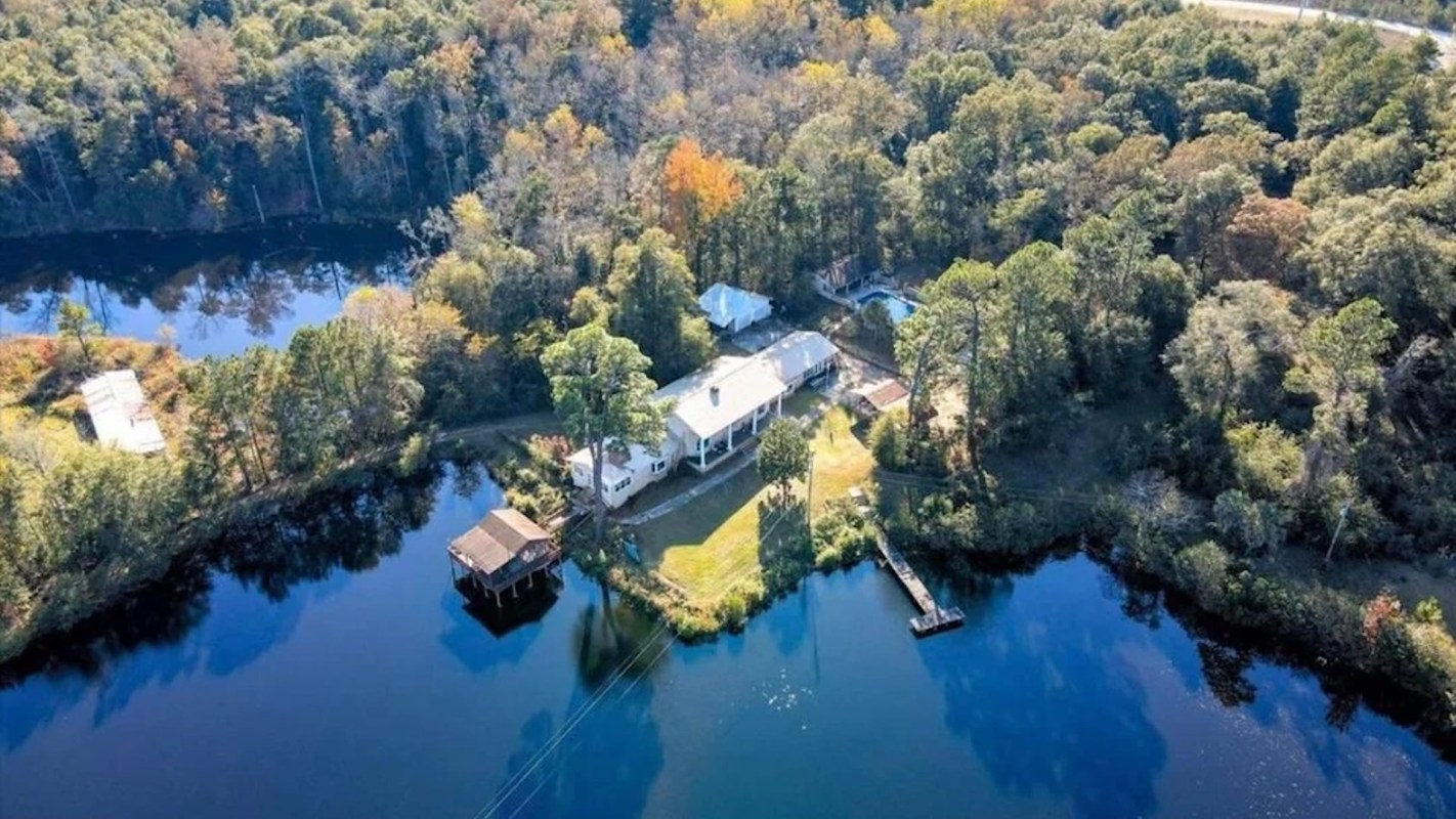 One Redditor shared photos of what they described as a horrible house in a beautiful location, calling it a McMansion.