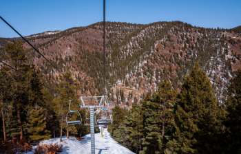 The northern New Mexico ski town of Red River depends heavily on winter visitors, but rising temperatures and a lack of natural snowfall have led to fewer travelers and less income.