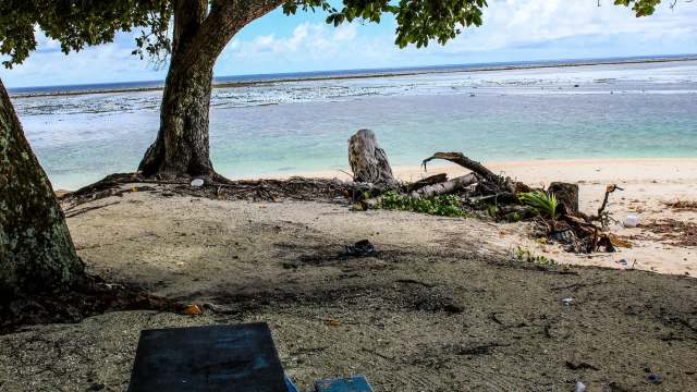 Ocean waters, creeping higher each year, are a concern as a concrete dome filled with atomic remnants was placed in the Marshall Islands.