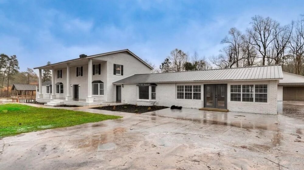 One Redditor shared photos of what they described as a horrible house in a beautiful location, calling it a McMansion.