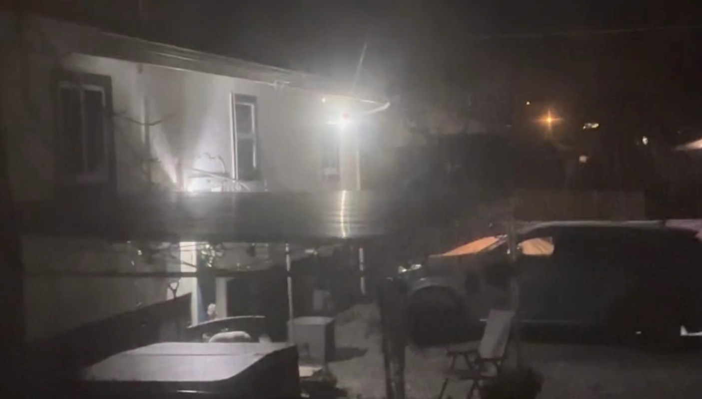 A homeowner shared a video showing a neighbor's powerful outdoor light flashing directly into their window at night.