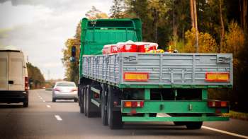 A 74-year-old man was fined for illegally dumping waste, including metal dumpsters, behind stores in Canterbury.
