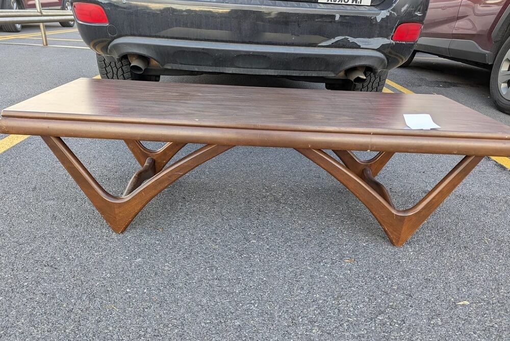 A simple trip to the thrift store resulted in an unexpectedly high-quality coffee table designed by Adrian Pearsall for a jaw-droppingly low price.
