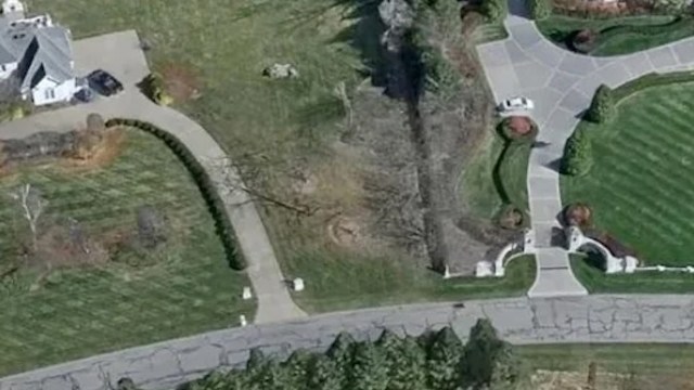 An aerial photo of a 5,000-square-foot mansion beside a 50,000-square-foot mansion sparked a conversation about overconsumption.