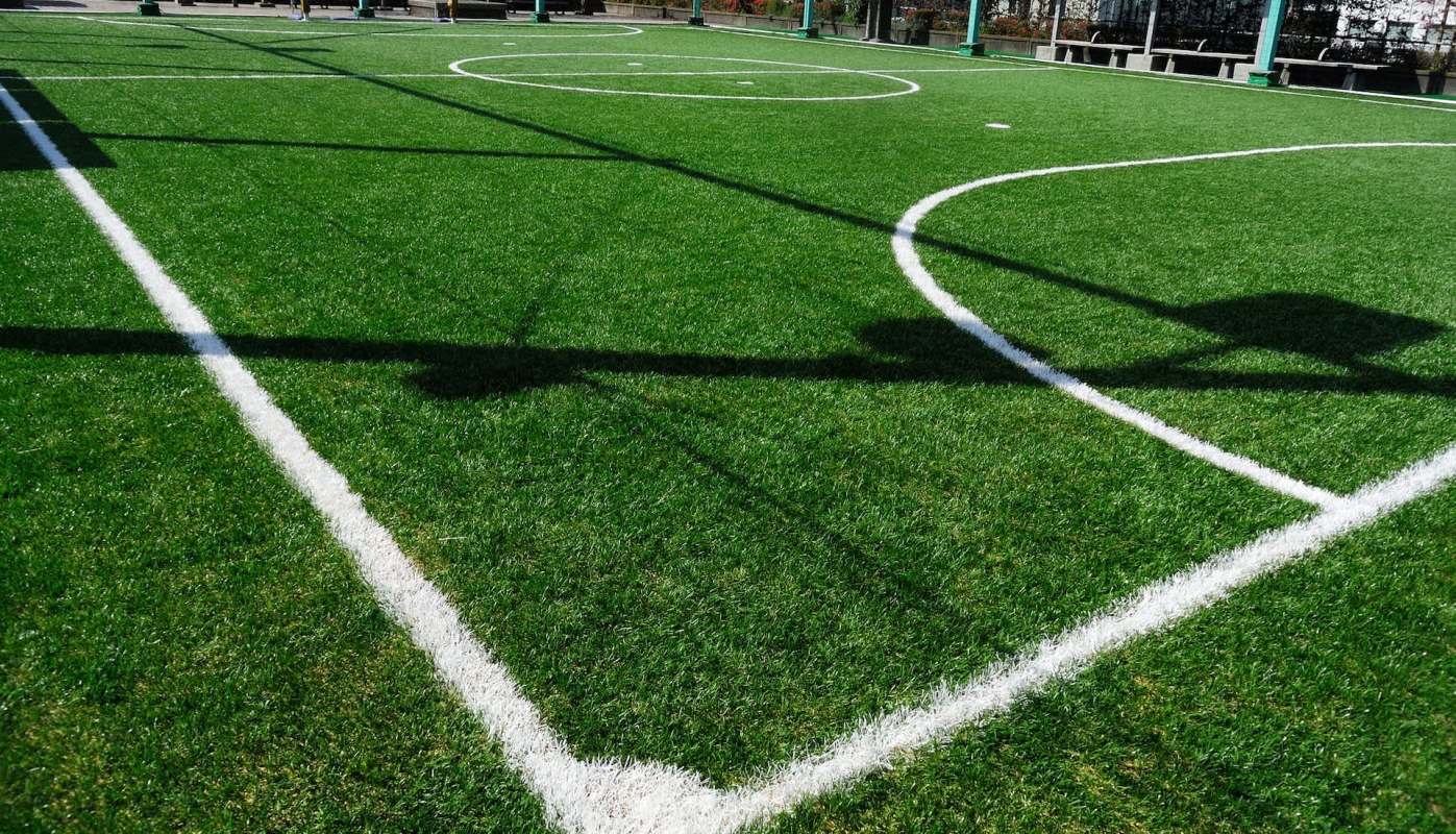 A business owner and local sports fan in Vermont is pushing to replace the grass athletic fields at his town's high school with artificial turf.