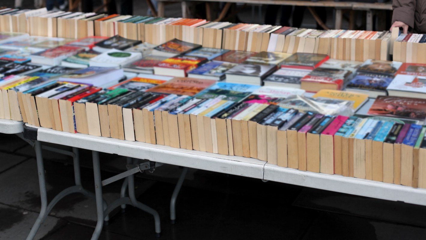 One Redditor found $50 in a secondhand book, prompting a discussion about unexpected thrift store windfalls.