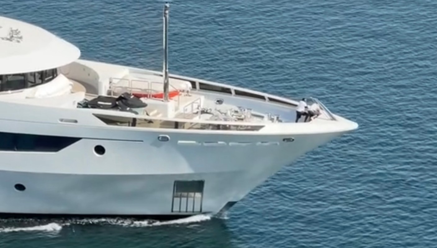 A TikTok video of a superyacht with an F1 car had people fuming over the owner's display of wealth.