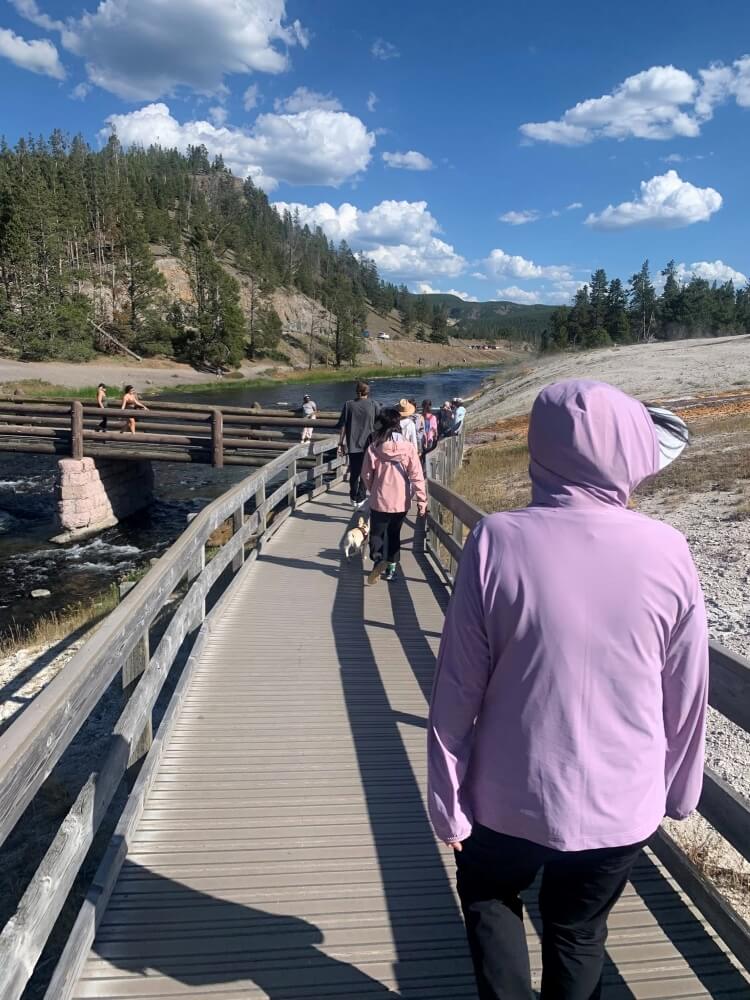 Photos were posted of tourists taking pictures on a protected tundra ecosystem in Rocky Mountain National Park.
