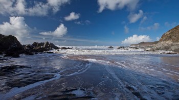 Community beach cleaners have found plastic waste uncovered there going back decades and originating from far away.