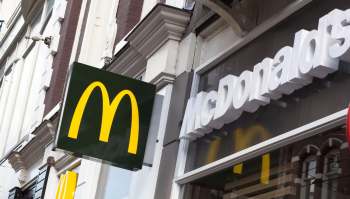 Some McDonald's stores are offering reusable packaging for anyone not eating take-out, in an attempt to reduce plastic waste.