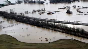 Atmospheric river storms are increasingly testing aging levees across the West Coast — and recent failures show just how vulnerable millions of Americans may be.