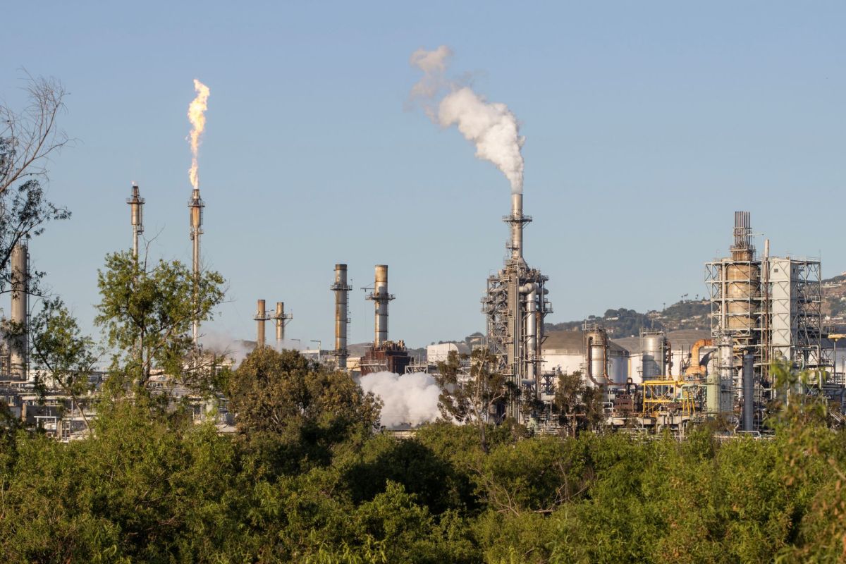 Richmond, California's residents are worried about the health costs of living in a polluted city near a refinery as sea levels rise and storms intensify.