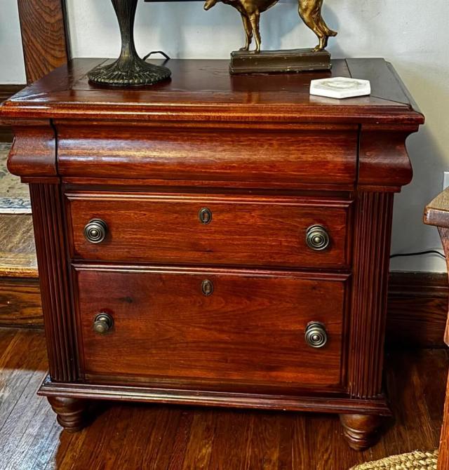 A photo of an Ethan Allen nightstand has been gaining attention, surprising viewers who assumed the original poster must have lived in a wealthy area.