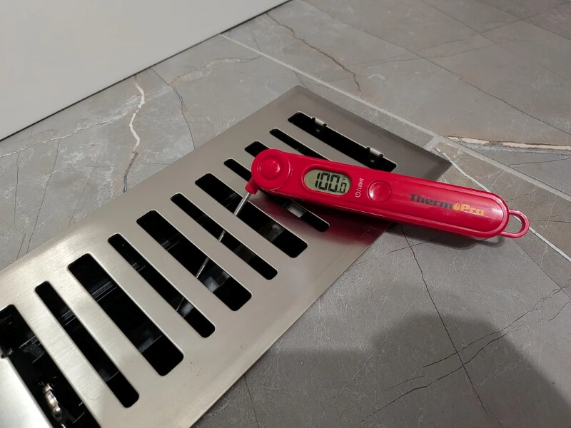 One homeowner shared their heat pump thermostat readings to show how effective Mitsubishi systems are at keeping indoor temperatures comfortable.