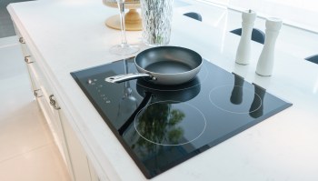 Airbnb hosts shared their reviews after a fellow host expressed concerns about installing an induction stove in a rental.