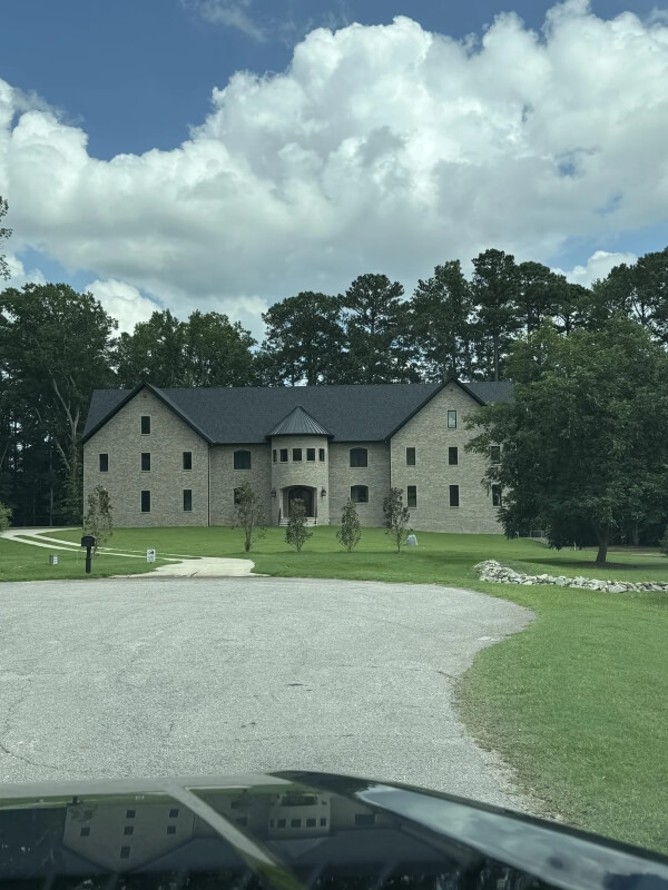 One Reddit user shared their harrowing experience of witnessing the construction of a McMansion in their neighborhood.