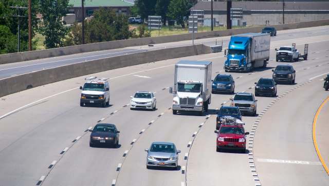 An Indianapolis driver almost crashed because of a moving advertisement on the road.