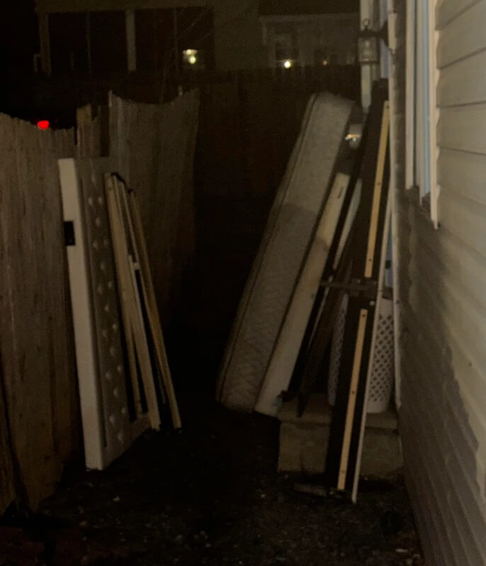 One Reddit user shared how their neighbor blocked their narrow alleyway with discarded furniture and garbage.
