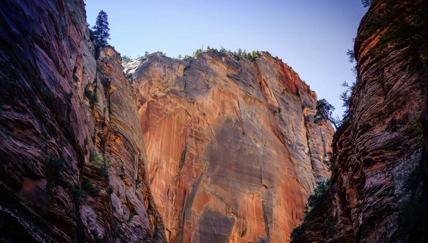 A video of campers hopping around rock formations over a canyon has angered Instagrammers and national park enthusiasts.