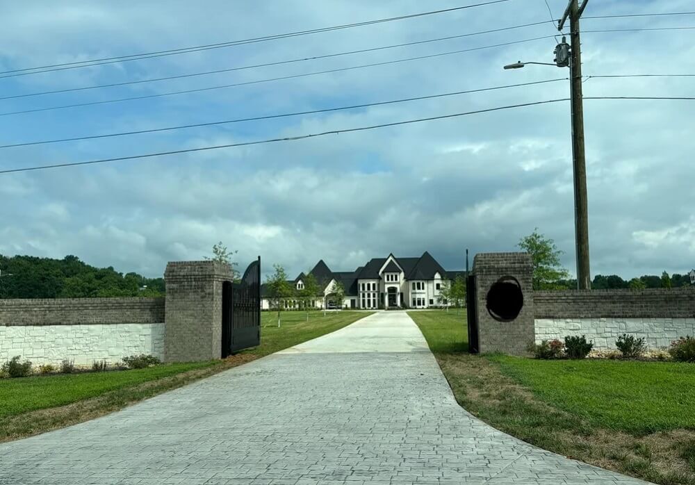 One Redditor spotted a pair of gaudy houses while visiting their parents and managed to dig up the story behind the McMansion competition.
