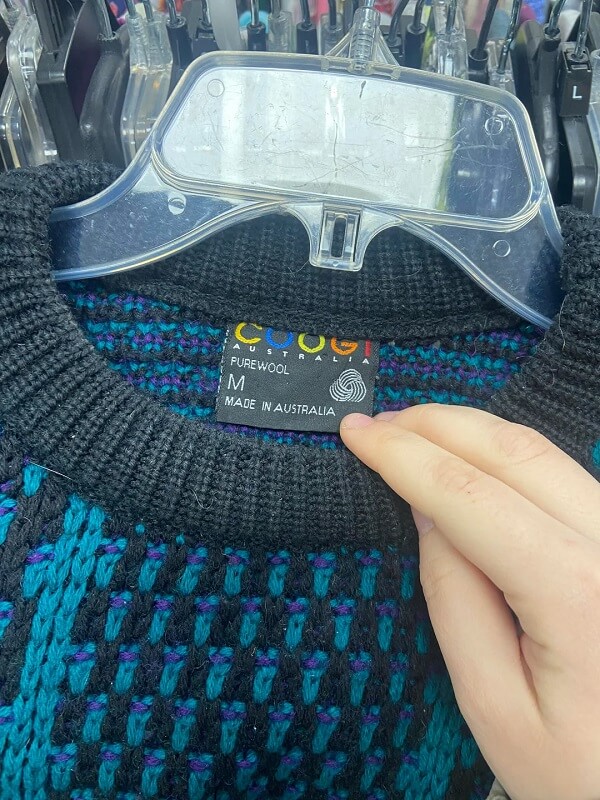 A shopper discovered a high-end Coogi sweater for literal pennies on the dollar at a thrift store.